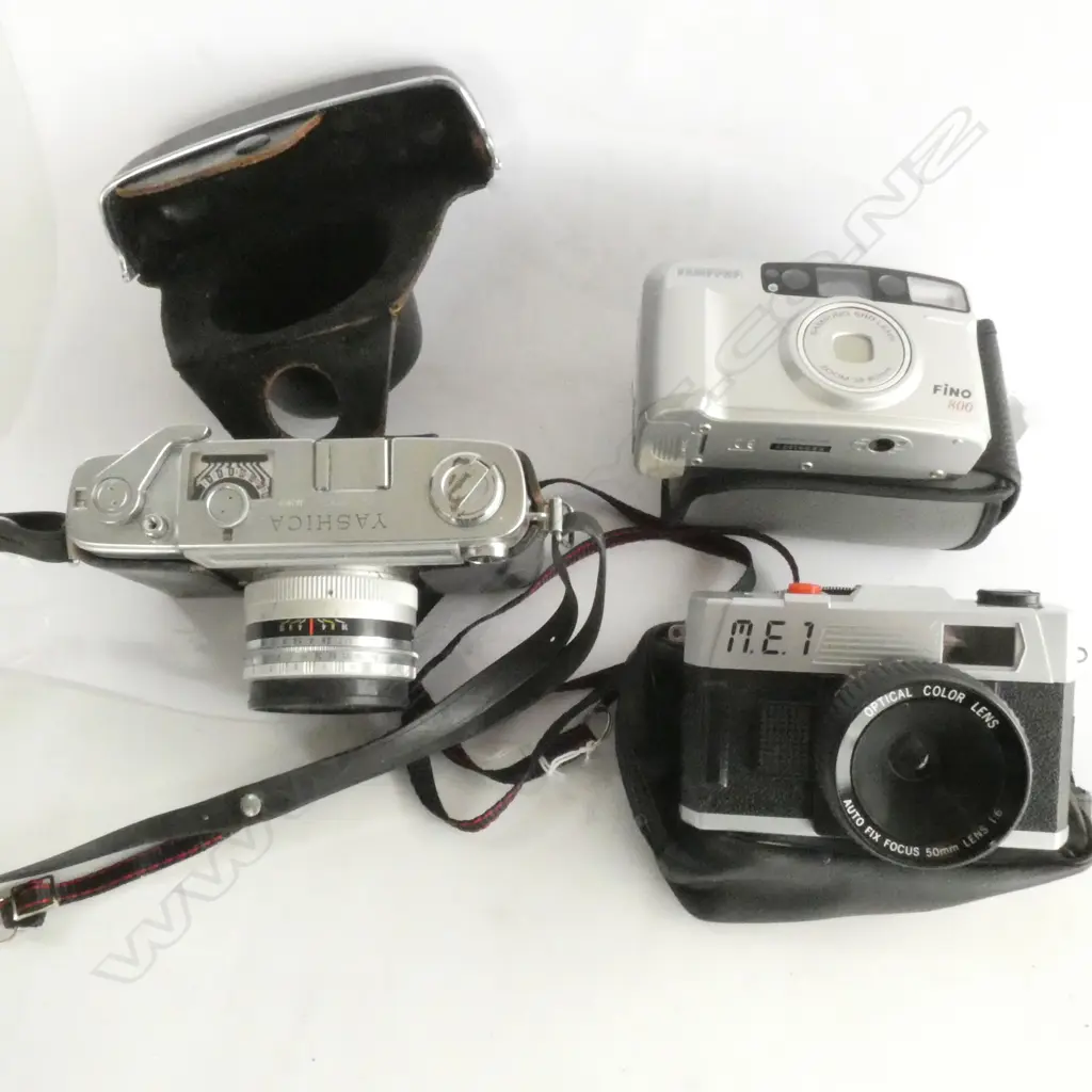 THREE OLD FILM CAMERAS, SAMSUNG, YASHICA + 1 OTHER. Image 1++