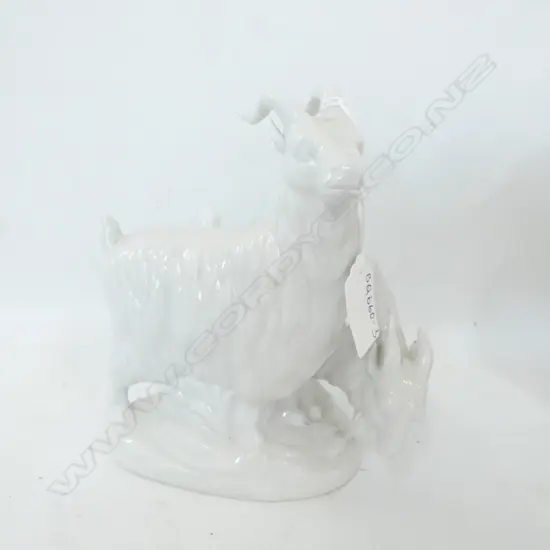 OLD WHITE PORCELAIN GOATS MONEY BOX. H. 180MM