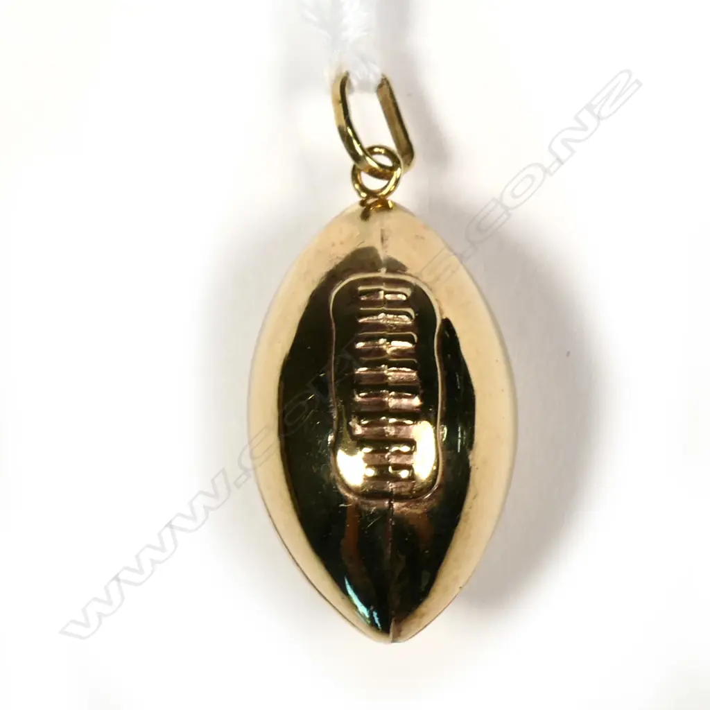 9CT GOLD RUGBY BALL CHARM L. 25MM 1.07GMS Image 1++