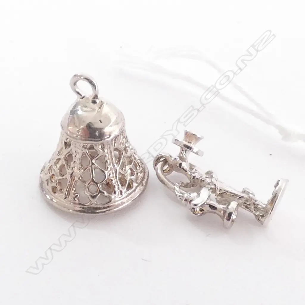 TWO SILVER CHARMS Image 1++