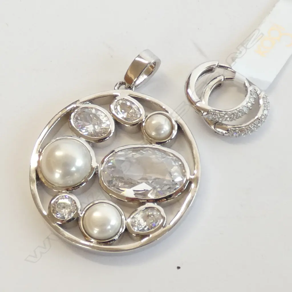CIRCULAR KAGI PENDANT & EARRINGS Image 1++