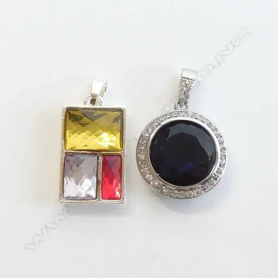 PAIR OF KAGI PENDANTS