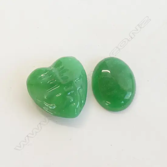 TWO JADE CUT STONES HEART & OVAL