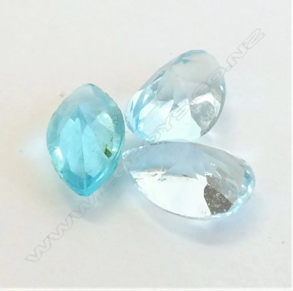THREE BLUE TOPAZ OR AQUAMARINE GEMSTONES  Image 1++