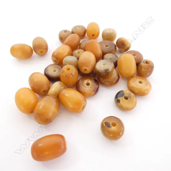 BAG ASSORT SHAPED AMBER BEADS 