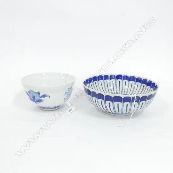 TWO LARGE OLD CHINESE BLUE & WHITE BOWLS. DIA. 250MM & 180MM - CRACK TO SMALLER BOWL.