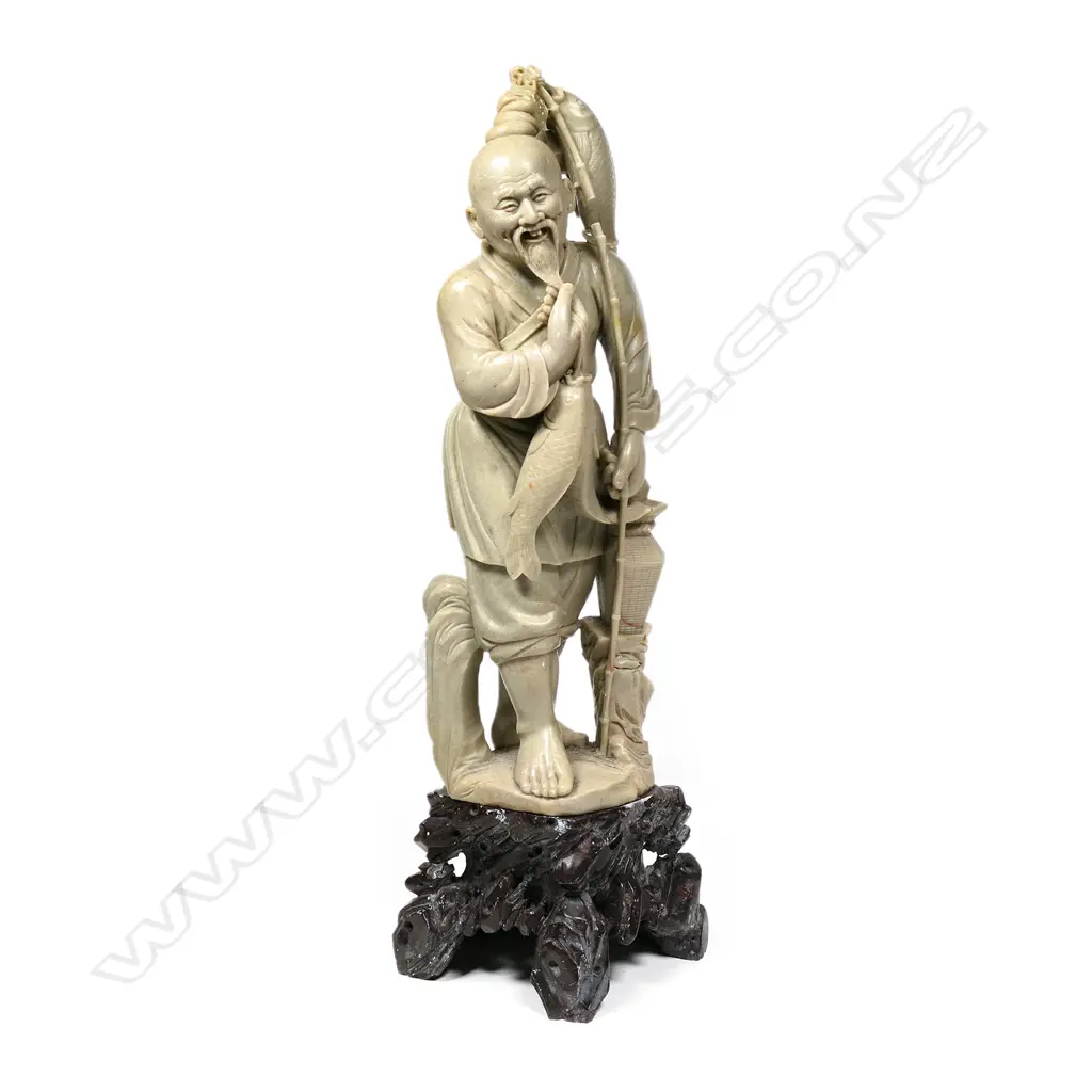 ORIENTAL CARVED HARDSTONE FIGURE OF FISHERMAN WITH FISH & POLE,  FAULTS, H. 410MM Image 1++
