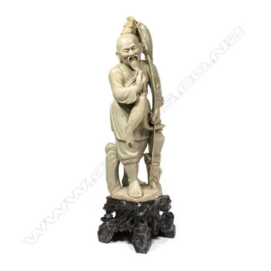 ORIENTAL CARVED HARDSTONE FIGURE OF FISHERMAN WITH FISH & POLE,  FAULTS, H. 410MM