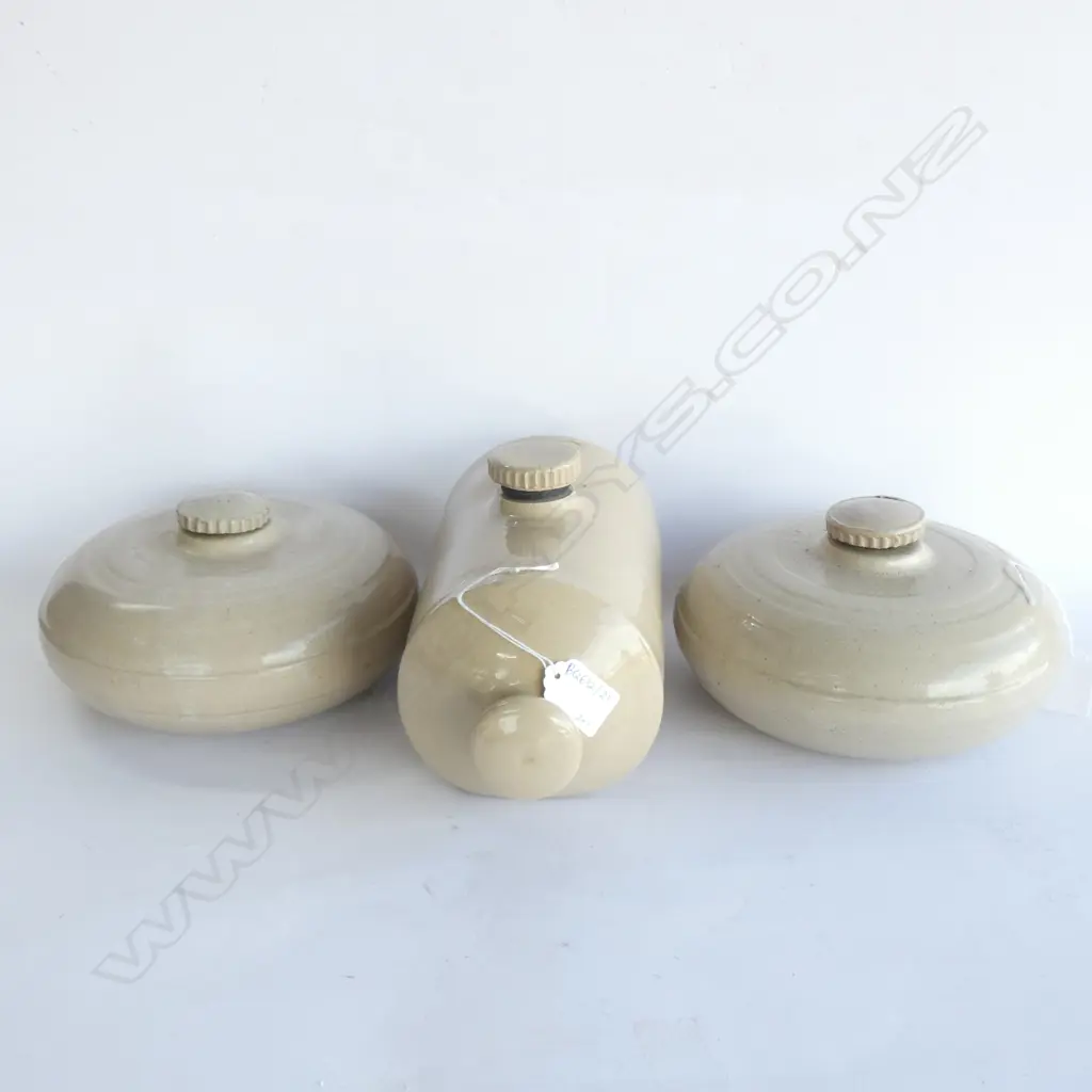 3 STONEWARE BED WARMERS; 2 CIRCULAR, 1 BOTTLE ONE STOPPER BROKEN Image 1++