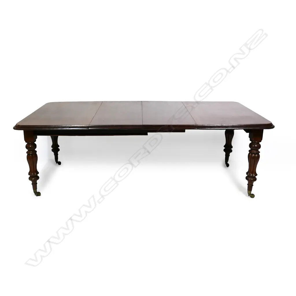 A Victorian eight-seater mahogany dining table Image 1++