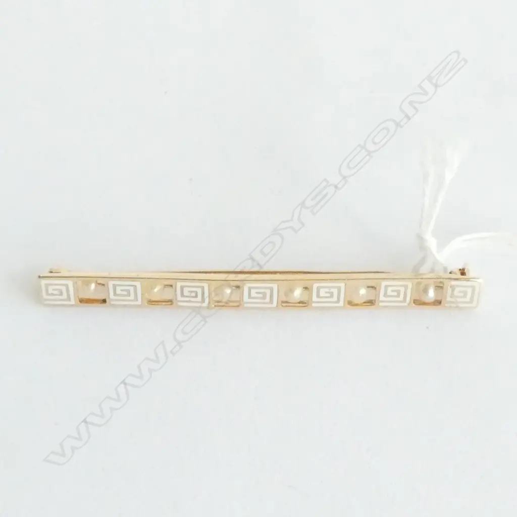 A 14ct. gold enamel and pearl brooch Image 1++