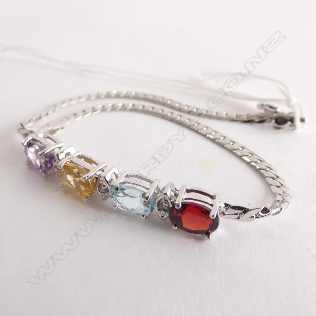 18CT WHITE GOLD PLATED AND GEMSTONE BRACELET Image 1++