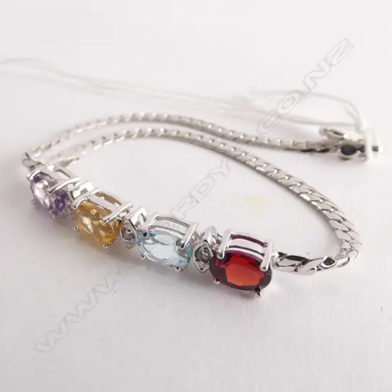 18CT WHITE GOLD PLATED AND GEMSTONE BRACELET