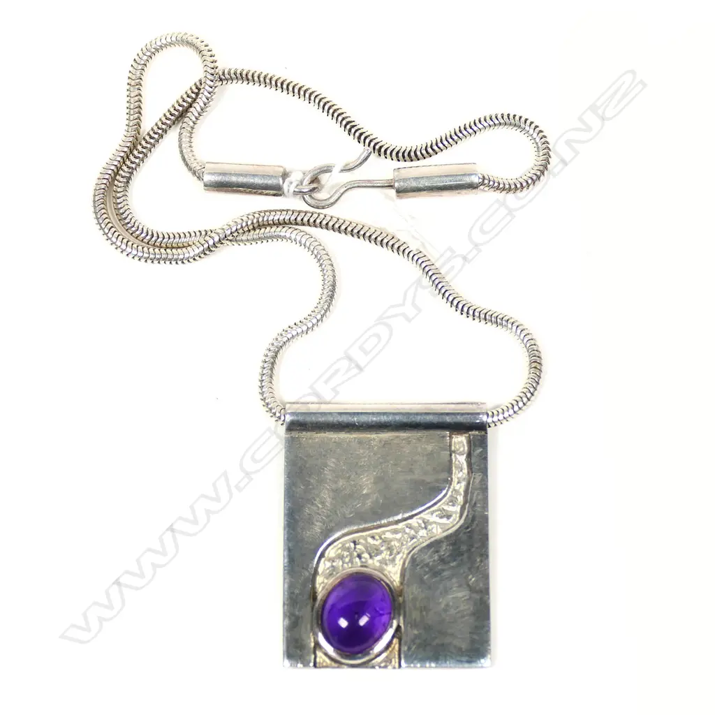 SILVER MODERNIST PENDANT w CABOCHON AMETHYST, by JENS HANSEN for exhibition at Watson's Jewellers ChCh. c.1980s.  Image 1++