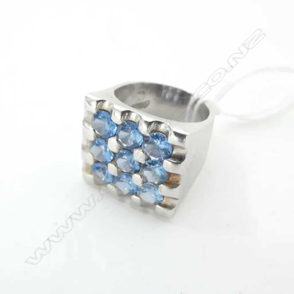 SILVER RING PAVE SET WITH 9 BLUE CZs Image 1++