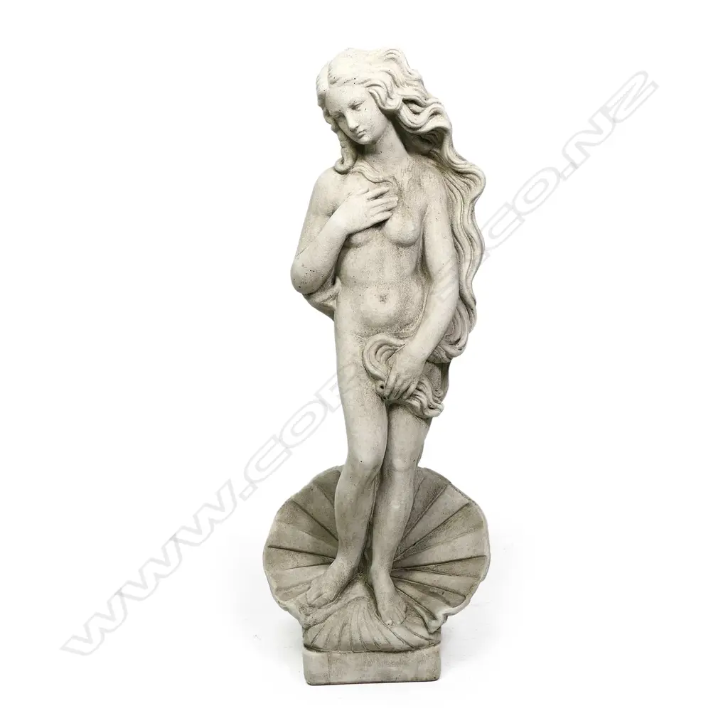 A classical garden statue of a naked maiden 'Shell Girl', finely cast concrete, she stands within a shell, her long hair providing some modesty. H.865mm. Image 1++