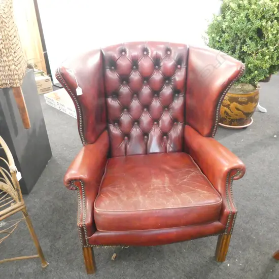 MAROON LEATHER WING CHAIR BUTTONED BACK