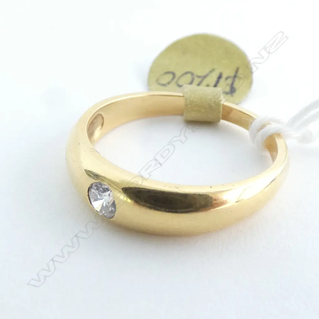 18CT GOLD BAND SHOT SET WITH 0.16CT DIAMOND Image 1++