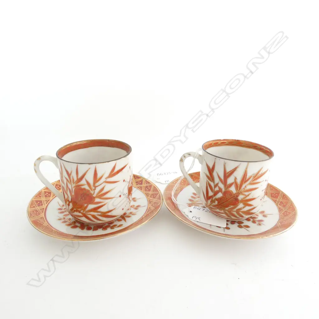 PAIR OF KANGXI-STYLE IRON RED & GOLD DEMI CUPS & SAUCERS... Image 1++