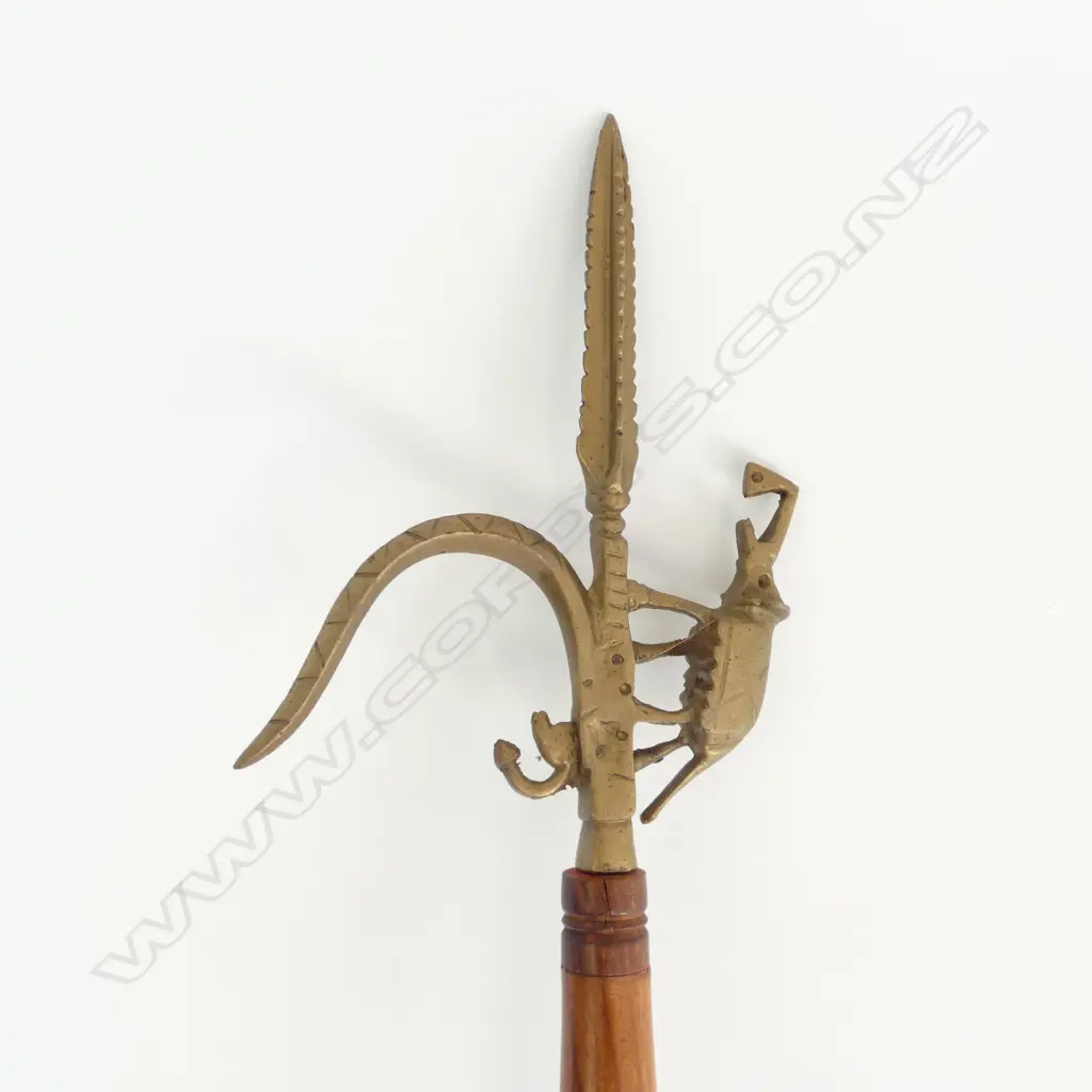 INDIAN BRASS & TEAK HOOKED IMPLEMENT WITH ELEPHANT DECORATION L 600MM Image 1++