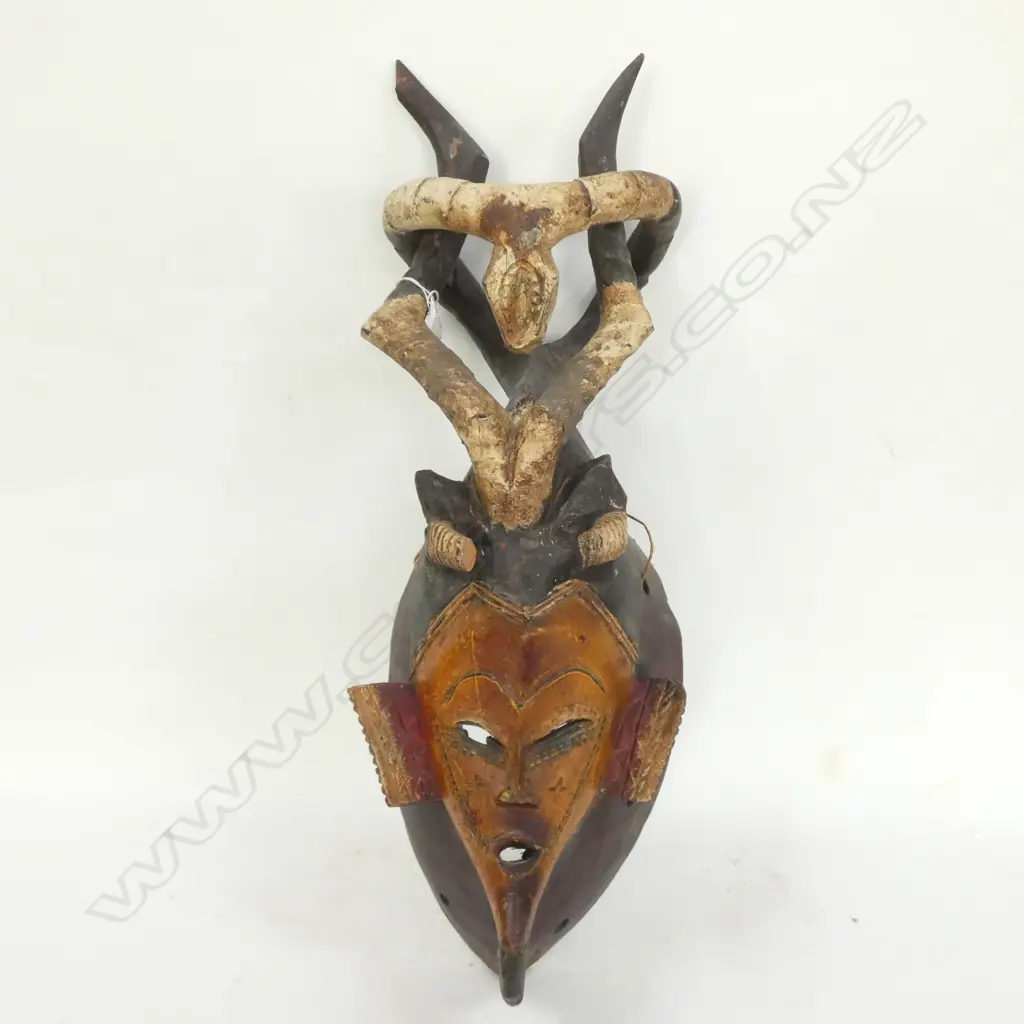 TRIBAL AFRICAN CARVED WOODEN MASK WITH ENTWINED HORNS - H. 600MM Image 1++