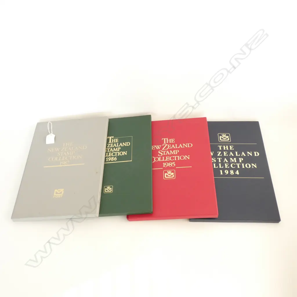 4 'THE NEW ZEALAND STAMP COLLECTION' BOOKS 1984 - 1987 Image 1++