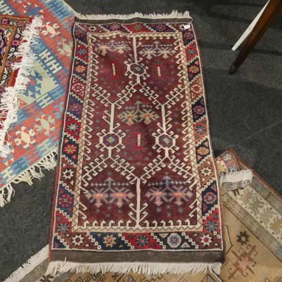HAND WOVEN ALL WOOL RUG 1320 X 750mm....