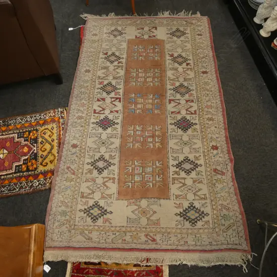 HAND KNOTTED RUG FADED