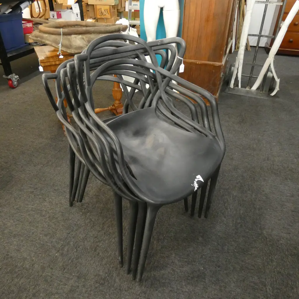 4 BLACK PLASTIC 'KARTELL STARCK' STYLE CHAIRS Image 1++