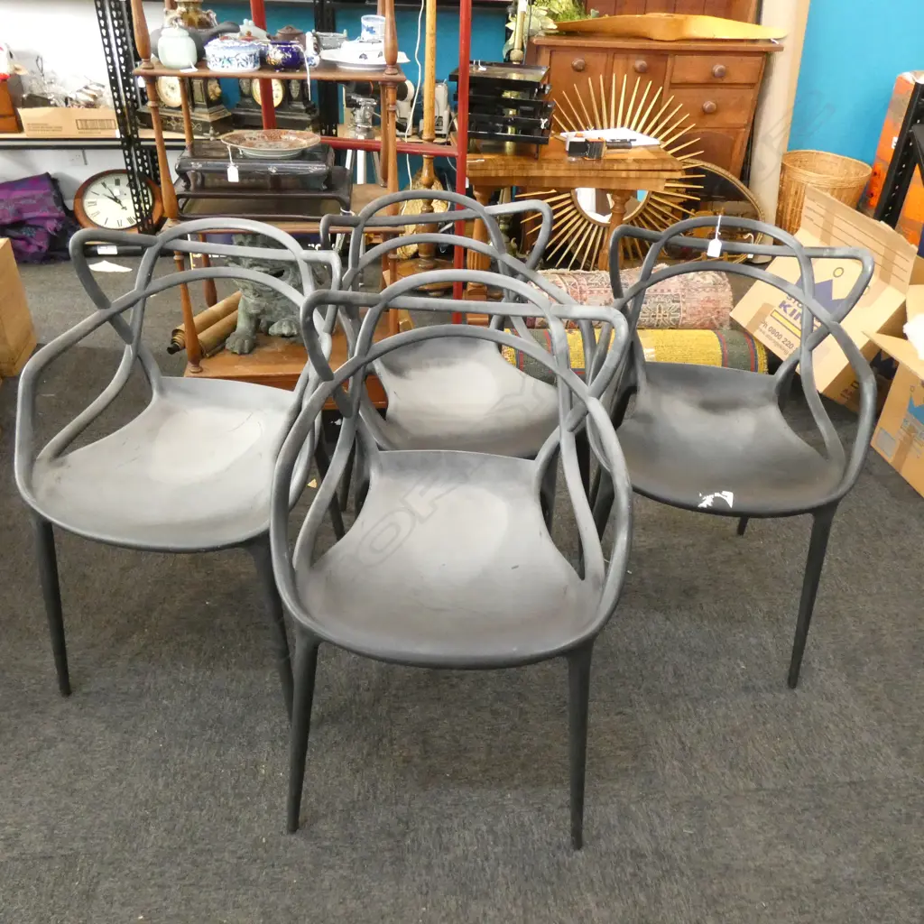 4 BLACK PLASTIC 'KARTELL STARCK' STYLE CHAIRS Image 1++