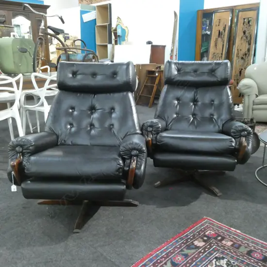 PR BLACK VINYL SWIVEL CHAIRS 