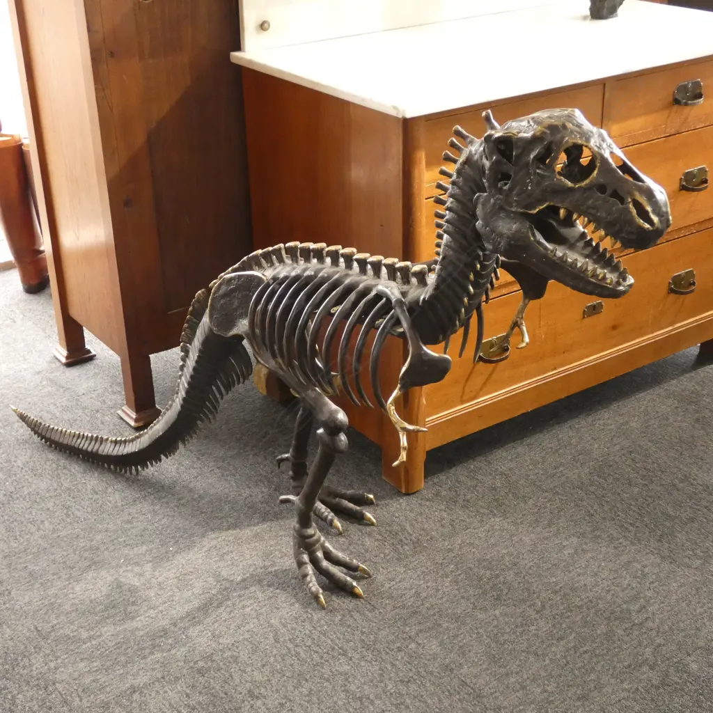 MODERN BRONZE SCULPTURE T-REX DINOSAUR SKELETON.  L.1550MM.  H.950MM Image 1++