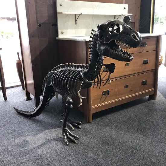 MODERN BRONZE SCULPTURE T-REX DINOSAUR SKELETON.  L.1550MM.  H.950MM