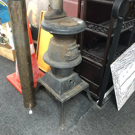 CAST IRON POT BELLY, SMALL. W 2 FLU SECTIONS