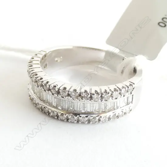18CT WHITE GOLD AND DIAMOND SET BAND TDW 0.60ct