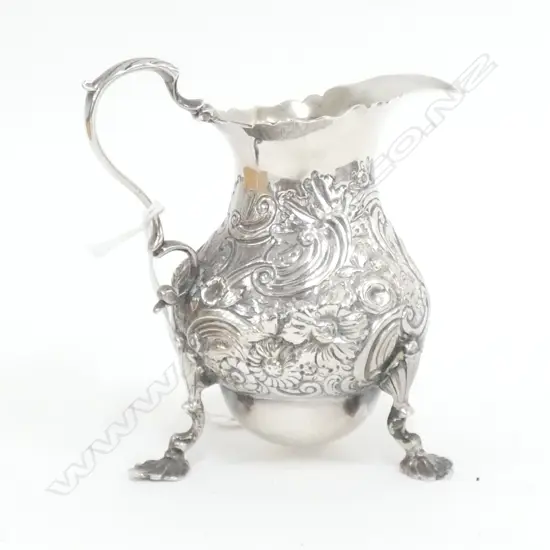 GEORGIAN SILVER CREAM JUG WITH ADDED IDIOSYNCRATIC BASE 141gm (W.W.)