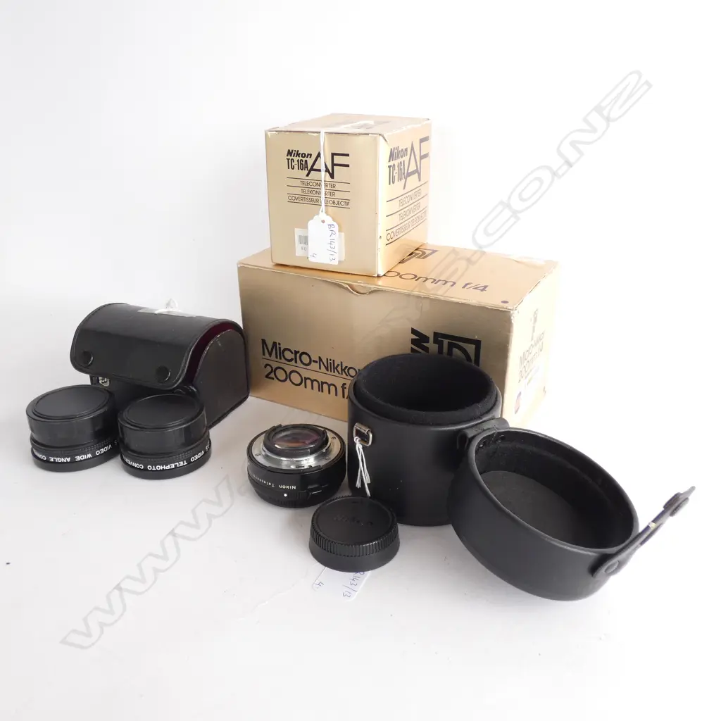NIKON 200MM F/4 LENS, TC-16A & B TELECONVERTERS + 2 C.P.S TELECONVERTERS ALL CASED Image 1++