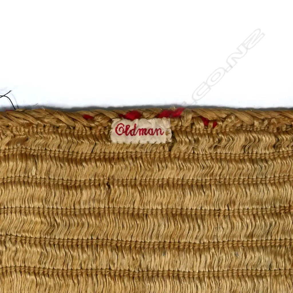 A rare Māori kaitaka cloak with tāniko borders Image 1++