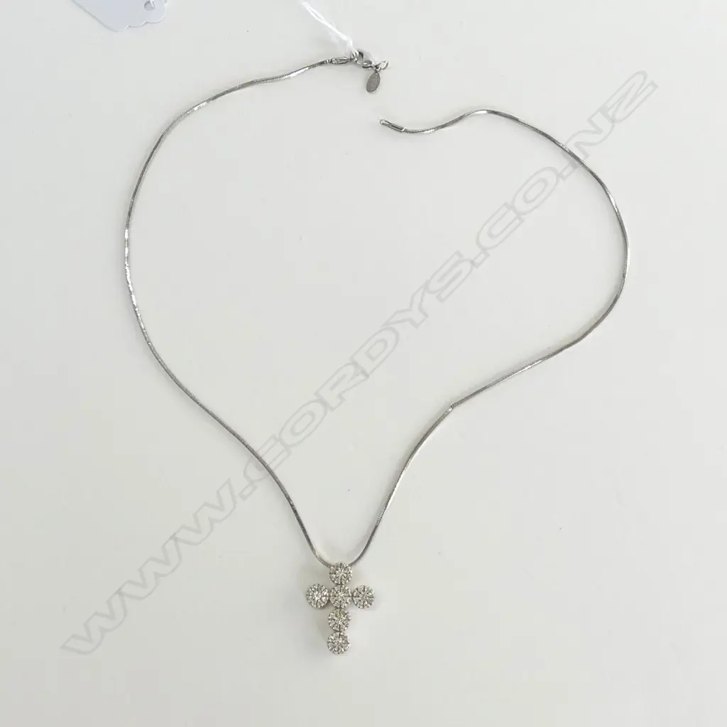 UNMARKED GOLD AND DIAMOND SET CROSS (WITH WHITE METAL CHAIN) Image 1++