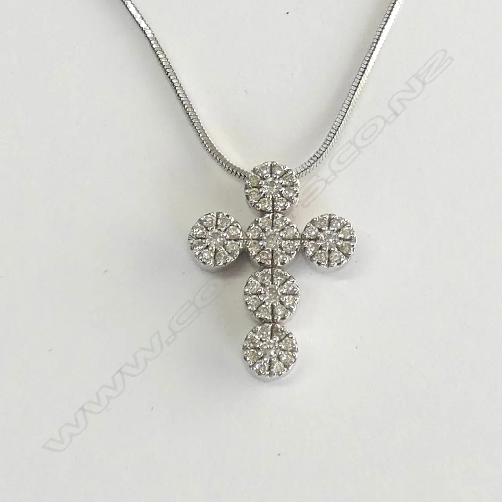 UNMARKED GOLD AND DIAMOND SET CROSS (WITH WHITE METAL CHAIN) Image 1++
