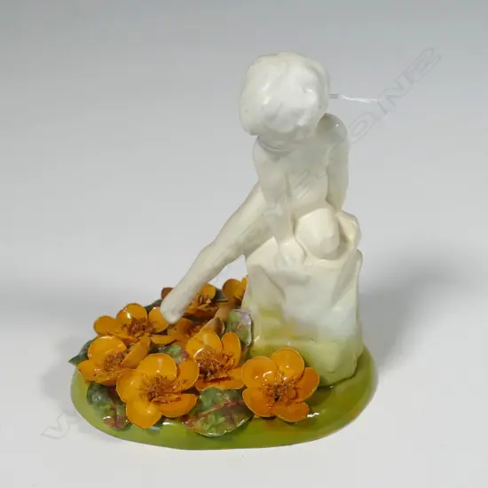 ROYAL DOULTON SEATED CHRUB, PROFESSIONALLY RESTORED ON BASE H.125MM