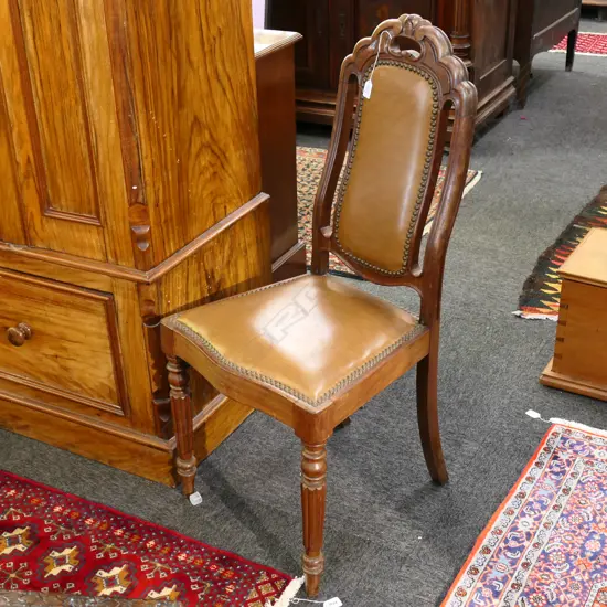 STUDDED LEATHER CHAIR