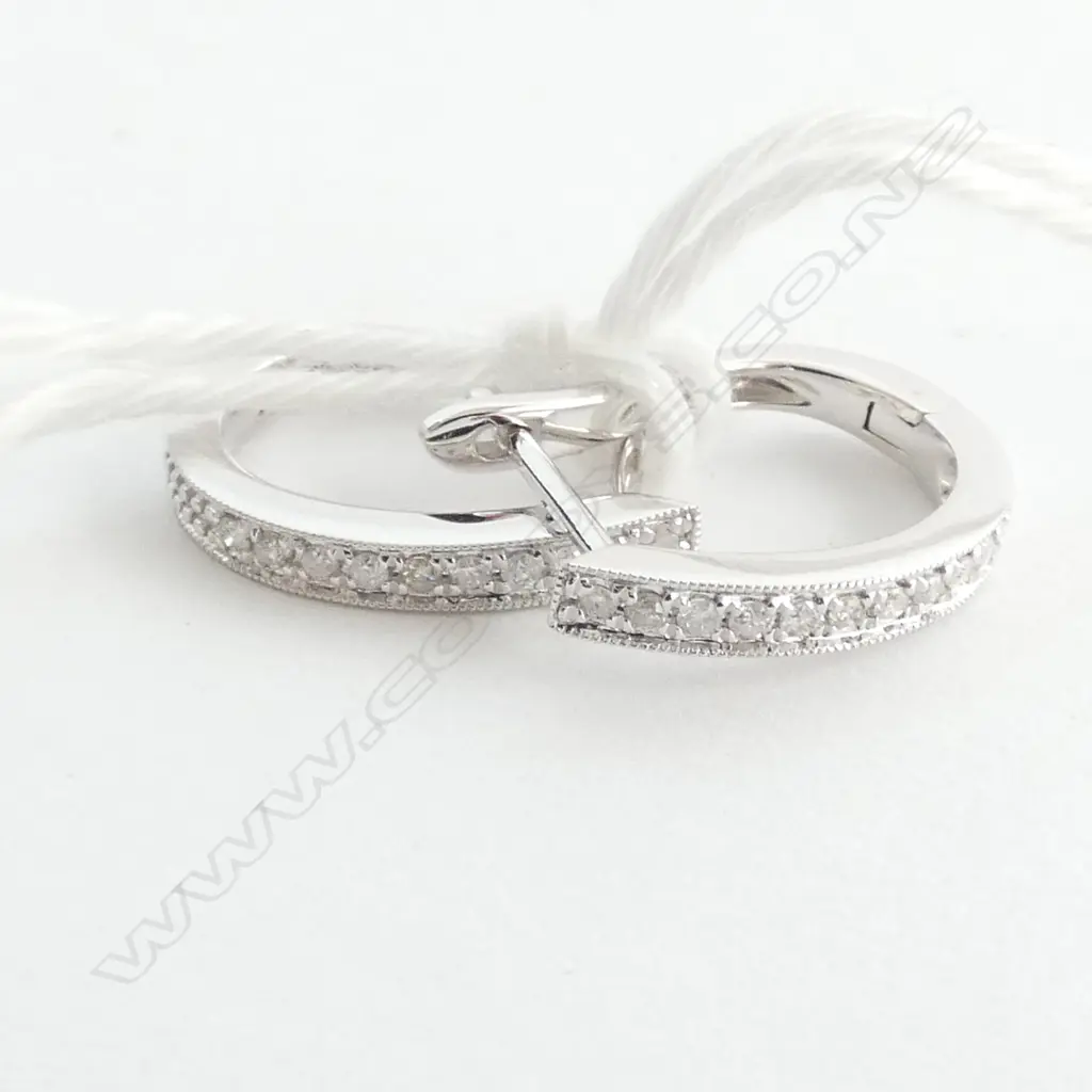 PAIR 9CT WHITE GOLD AND DIAMOND EARRINGS Image 1++