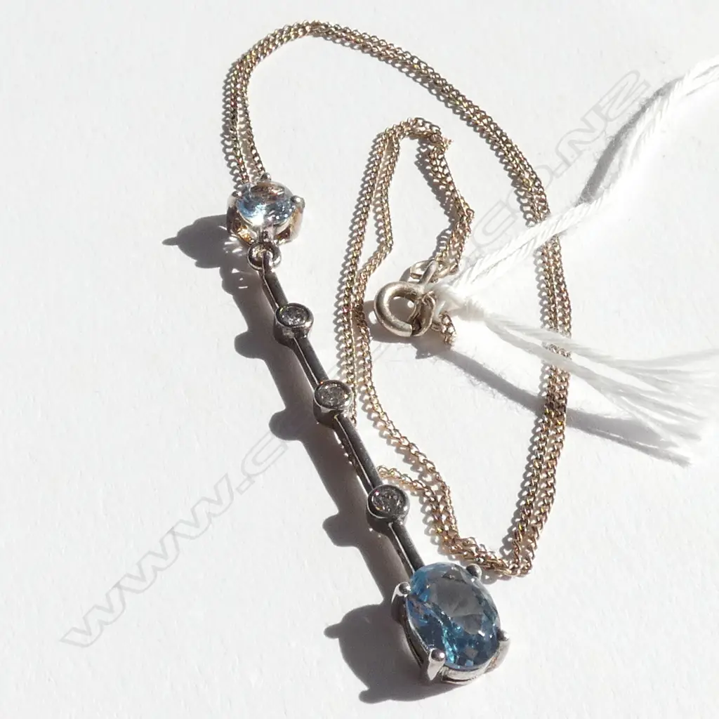 SILVER LONG PENDANT ON CHAIN PALE BLUE STONES Image 1++