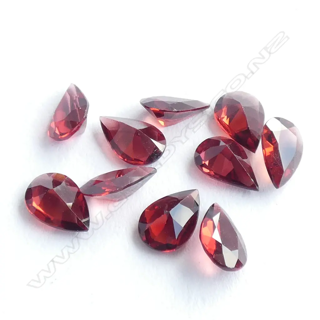 12.5CT FACETED GARNETS 10 PEAR STONES Image 1++