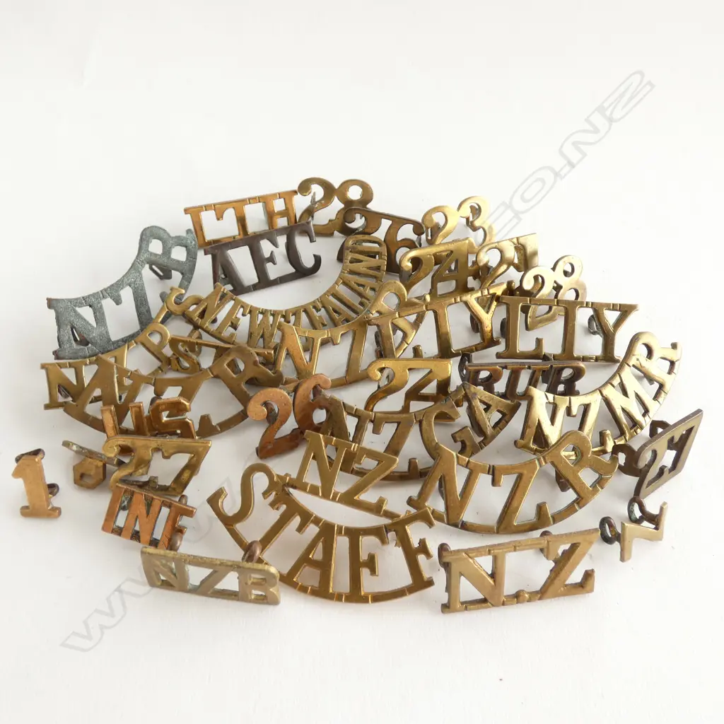 ASST. NZ WAR LETTERING BADGES  Image 1++