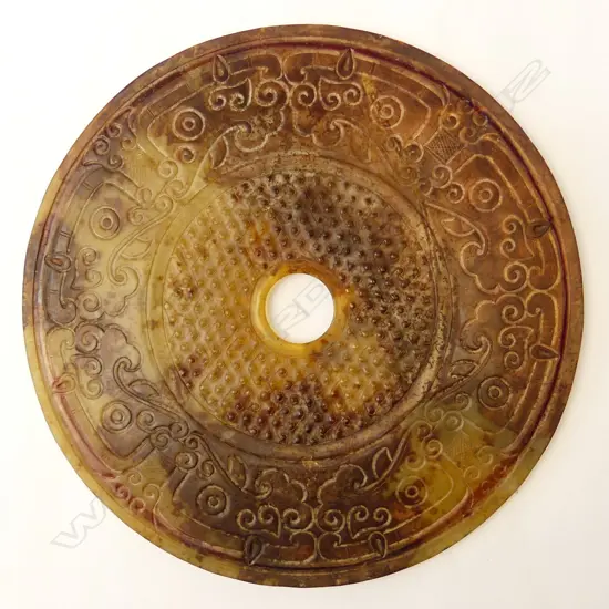 A large Chinese jade pi disc