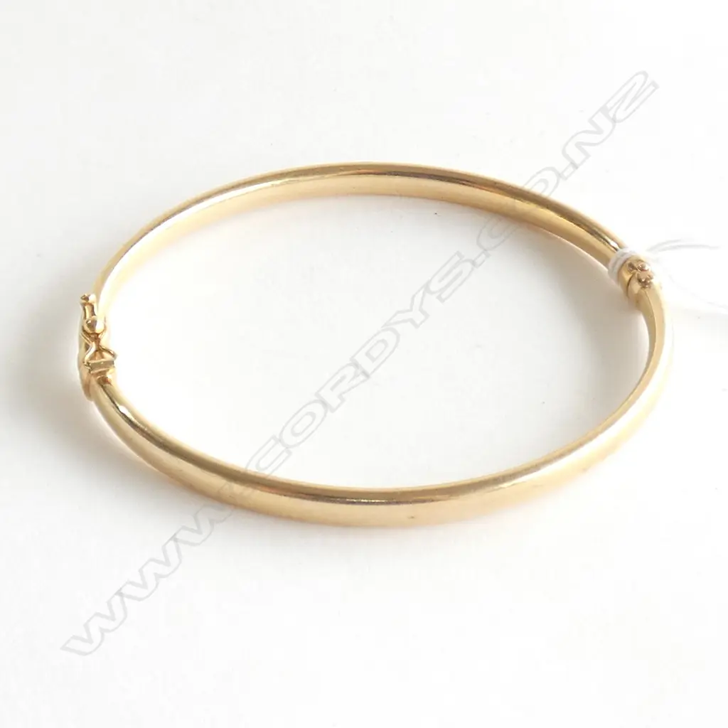 9CT YELLOW GOLD HINGED SNAP BANGLE Image 1++