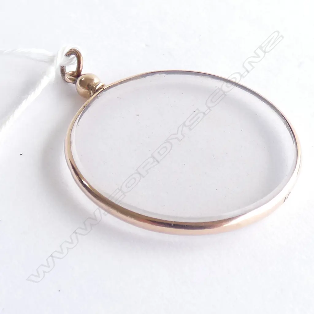 9 CT GOLD LOCKET PENDANT WITH GLASS COVERS DIA  32MM Image 1++
