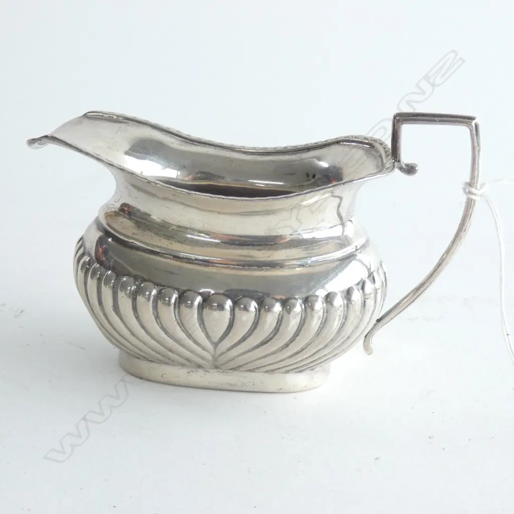 An Edwardian cream milk jug Image 1++
